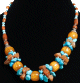 Collier ethnique boules jaune et pierres imitation turquoises decore de perles